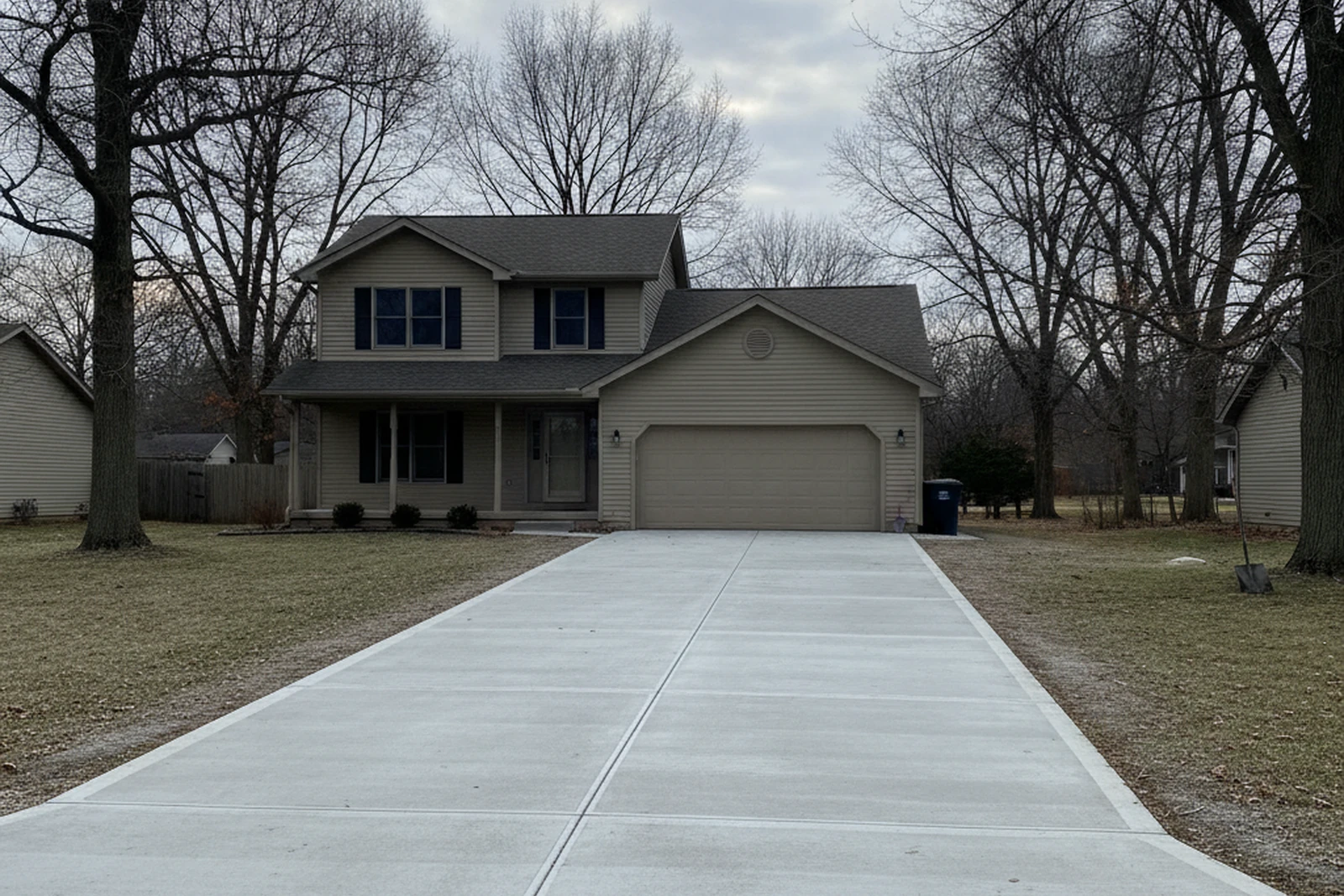 Completed concrete driveway South Bend Indiana St Joseph County Michiana air-entrained broom finish lake-effect snow