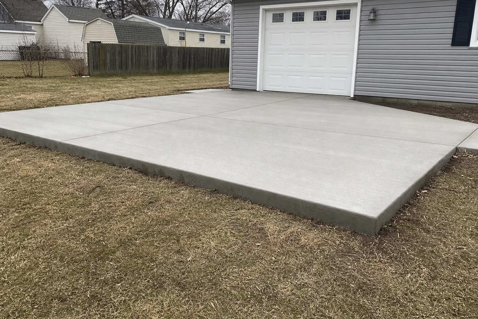 New broom-finished concrete slab in South Bend Indiana with clean control joints and finished edges